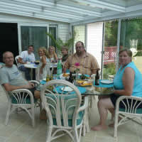 Family barbeque dinner in the sunroom 